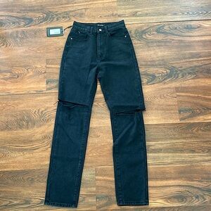 Black denim straight leg ripped jeans; size 4
